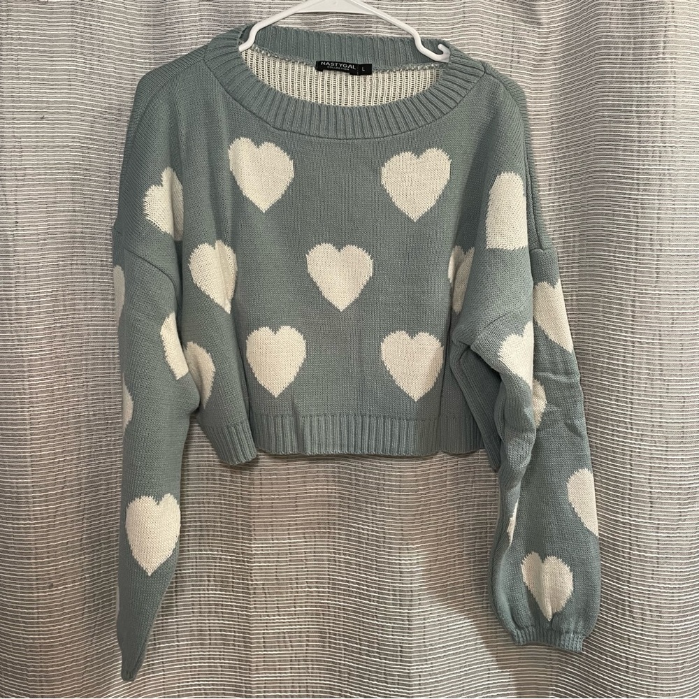 Teal blue crew neck sweater with cream white hearts